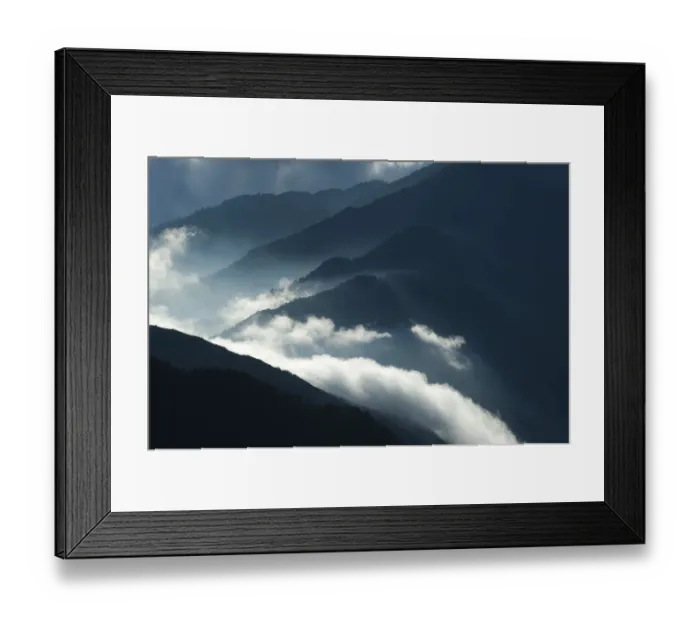 Framed Print : Upcoming clouds over forest covered mountains Framed Print : Upcoming clouds over forest covered mountains