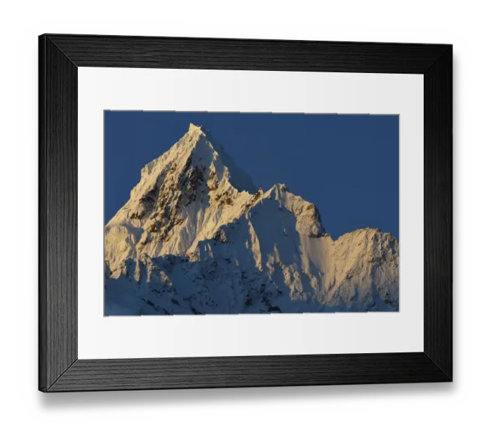 Framed Print : Sun shining at the Miancimu Peak, 6054 m, in the Meili Snow Mountain National park, Yunnan, China