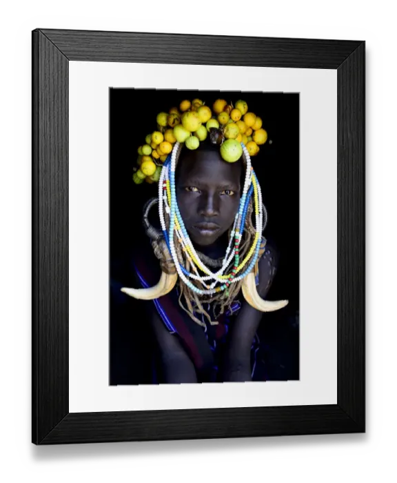 Framed Print : Young girl wearing traditional headdress, Mursi tribe, Mago National Park. Omo Valley Framed Print : Young girl wearing traditional headdress, Mursi tribe, Mago National Park. Omo Valley