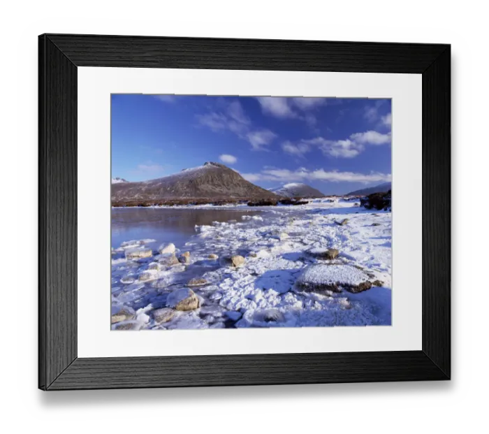 Framed Print : Lough Shannagh with light covering of snow on the beach and Doan peak in the background Framed Print : Lough Shannagh with light covering of snow on the beach and Doan peak in the background