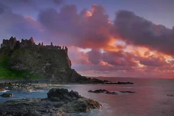 Dunluce Castle at sunset, North Antrim coast, County Antrim, Northern Ireland, UK