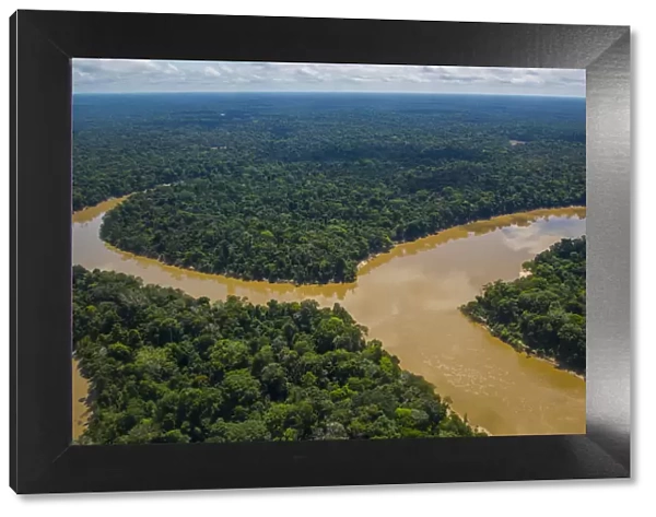 Aerial view of Mouth of the Yavari-Mirin River entering Yavari River and Amazon Rainforest