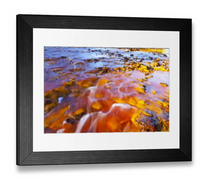 Framed Print : Red waters of the Rio Tinto, coloured by dissolved minerals, primarily iron. Andalusia
