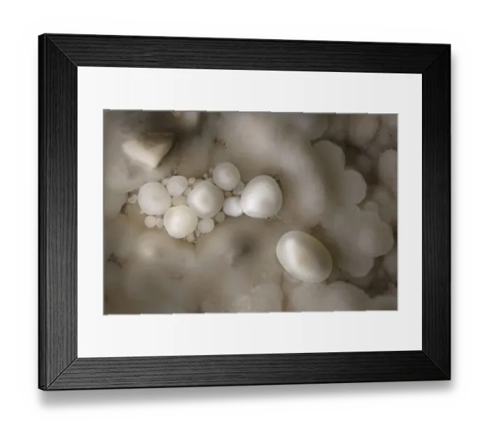 Framed Print : Cave Pearls, formed as dripping water rich in calcium salts deposits calcite around Framed Print : Cave Pearls, formed as dripping water rich in calcium salts deposits calcite around