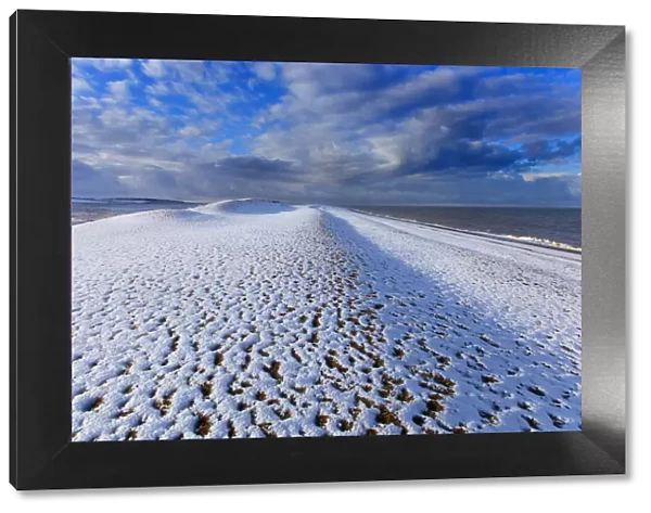 Cley Beach covered in snow, Norfolk. England, UK, January