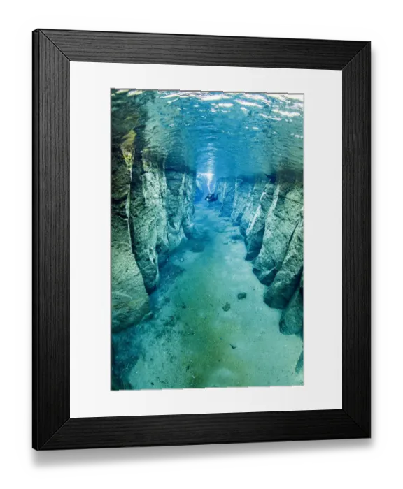Framed Print : Scuba diver exploring volcanic crack Nesgja, in Asbyrgi National Park, northern Iceland Framed Print : Scuba diver exploring volcanic crack Nesgja, in Asbyrgi National Park, northern Iceland