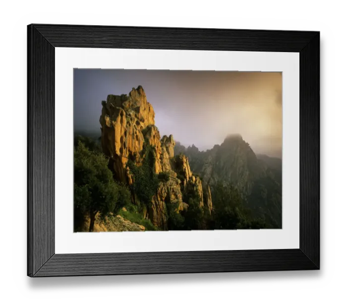 Framed Print : Rock formations in the fog at sunset, in the Calanche of Piana, Gulf of Porto UNESCO Framed Print : Rock formations in the fog at sunset, in the Calanche of Piana, Gulf of Porto UNESCO