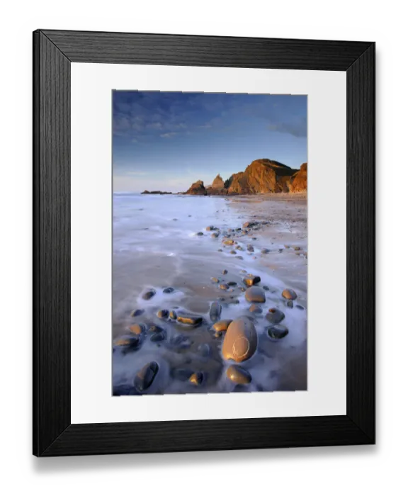 Framed Print : Tide washing over pebbles at Sandymouth bay, north Cornwall, UK. January 2009 Framed Print : Tide washing over pebbles at Sandymouth bay, north Cornwall, UK. January 2009