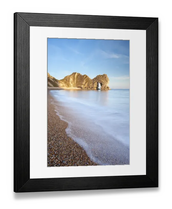 Framed Print : Durdle Door rock arch, evening light, near Lulworth, Dorset, England, UK. April 2010 Framed Print : Durdle Door rock arch, evening light, near Lulworth, Dorset, England, UK. April 2010