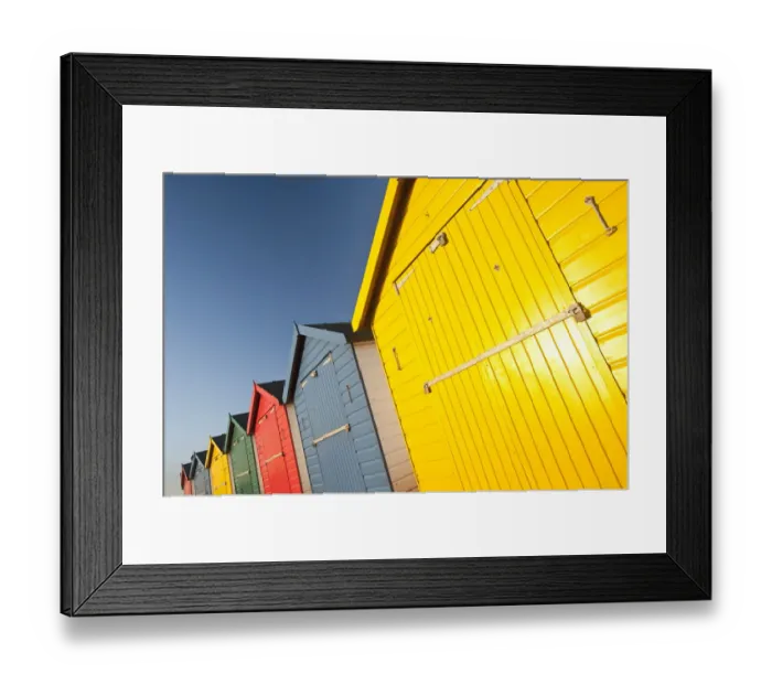Framed Print : Colourful beach huts in early morning light. Dawlish Warren, South Devon, UK, February Framed Print : Colourful beach huts in early morning light. Dawlish Warren, South Devon, UK, February