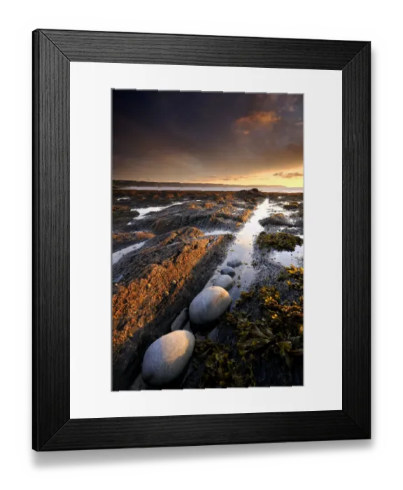 Framed Print : Abbotsham cliff, beach at low-tide, late evening light, Devon, UK. August 2008 Framed Print : Abbotsham cliff, beach at low-tide, late evening light, Devon, UK. August 2008