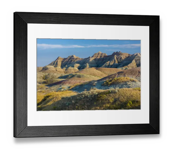 Framed Print : Late afternoon light warms the colors in the Yellow Mounds area, Badlands National Park Framed Print : Late afternoon light warms the colors in the Yellow Mounds area, Badlands National Park