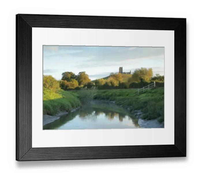 Framed Print : Landscape with river Parrett in foreground and Burrow Mump in background, with ruined church