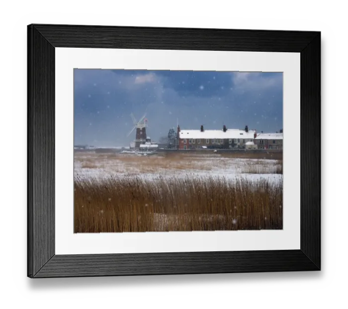 Framed Print : Cley Mill and Reedbed in winter snow storm, Norfolk, UK, February Framed Print : Cley Mill and Reedbed in winter snow storm, Norfolk, UK, February