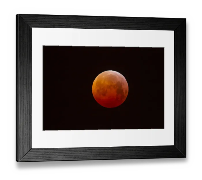 Framed Print : Super Blood Wolf Moon or Blood Moon Eclipse so called because a Lunar eclipse is appearing