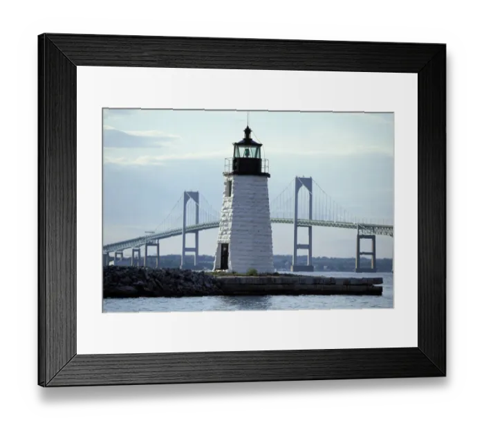 Framed Print : The Newport Harbor Light (Goat Island Light) standing framed by the giant Newport Bridge Framed Print : The Newport Harbor Light (Goat Island Light) standing framed by the giant Newport Bridge