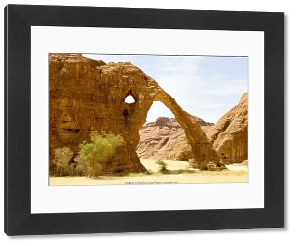 Elephant arch - eroded sandstone rock formation in the Ennedi Natural And Cultural