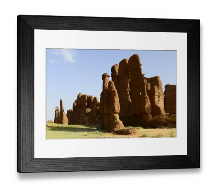 Framed Print : Eroded sandstone rock formations in the Ennedi Natural And Cultural Reserve Framed Print : Eroded sandstone rock formations in the Ennedi Natural And Cultural Reserve
