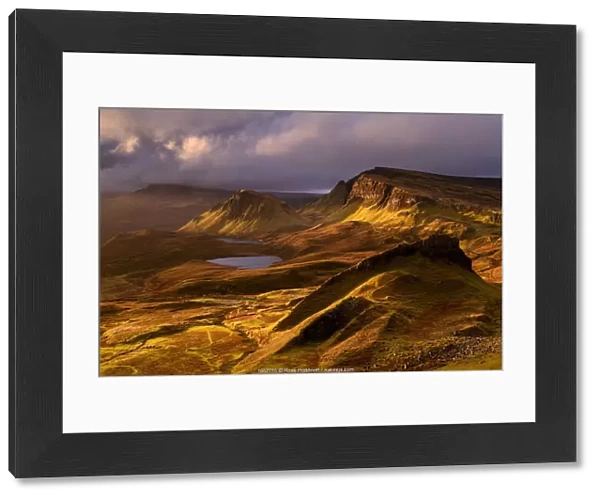 The Quiraing in golden morning light, eastern face of Meall na Suiramach