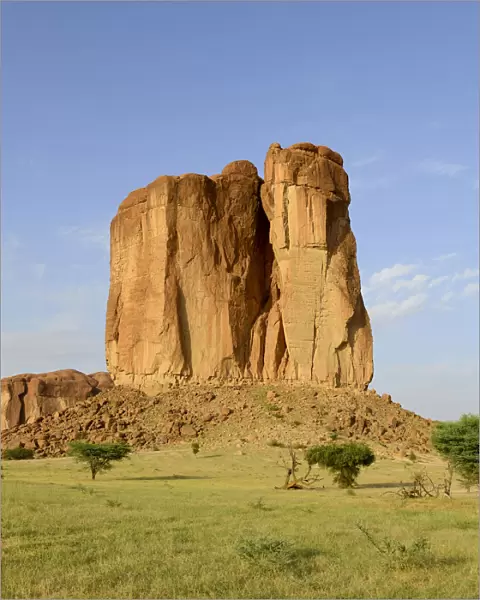 Eroded sandstone rock formation standing out in plateau in the Sahara desert