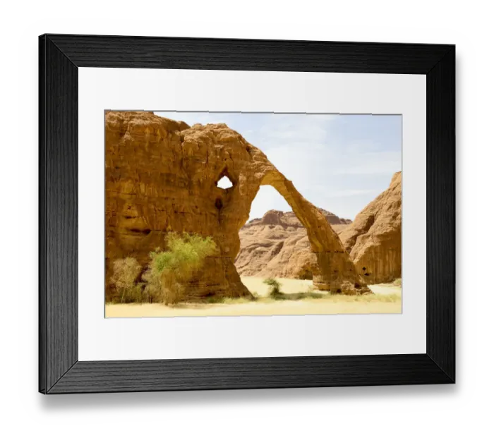 Framed Print : Elephant arch - eroded sandstone rock formation in the Ennedi Natural And Cultural Framed Print : Elephant arch - eroded sandstone rock formation in the Ennedi Natural And Cultural