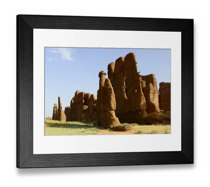 Framed Print : Eroded sandstone rock formations in the Ennedi Natural And Cultural Reserve Framed Print : Eroded sandstone rock formations in the Ennedi Natural And Cultural Reserve