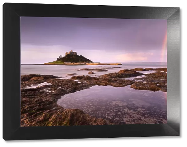 St Michaels Mount at sunrise with a rainbow over Penzance, Marazion, Wesat Cornwall