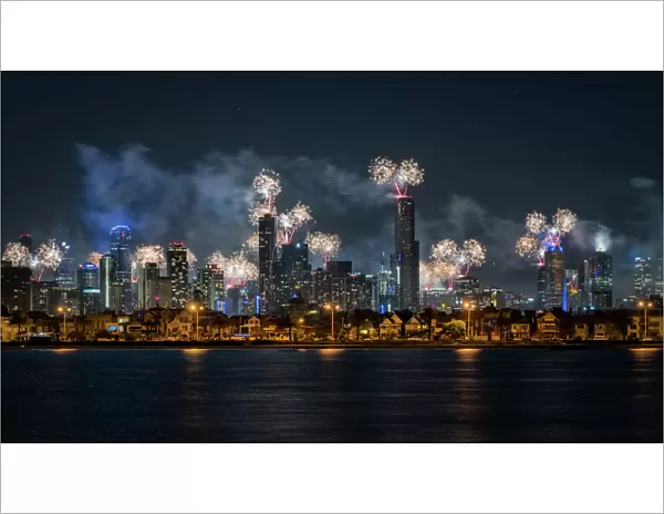 Fireworks over Melbourne city skyline for New Year celebrations