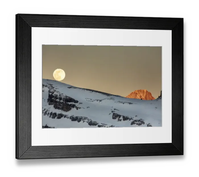 Framed Print : Moonrise over a mountain landscape in the evening. Leukerbad, Wallis, Valais