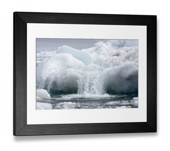 Framed Print : Meltwater flowing off an iceberg. Near Yalour Islands, Wilhelm Archipelago, Antarctica Framed Print : Meltwater flowing off an iceberg. Near Yalour Islands, Wilhelm Archipelago, Antarctica