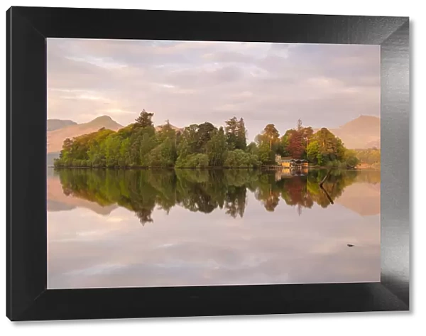 Derwentwater, posts and boathouse, early morning reflections