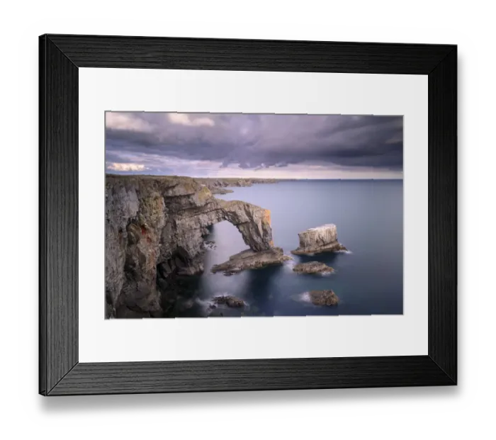 Framed Print : The Green Bridge of Wales sea arch and stack along limestone coastline Framed Print : The Green Bridge of Wales sea arch and stack along limestone coastline