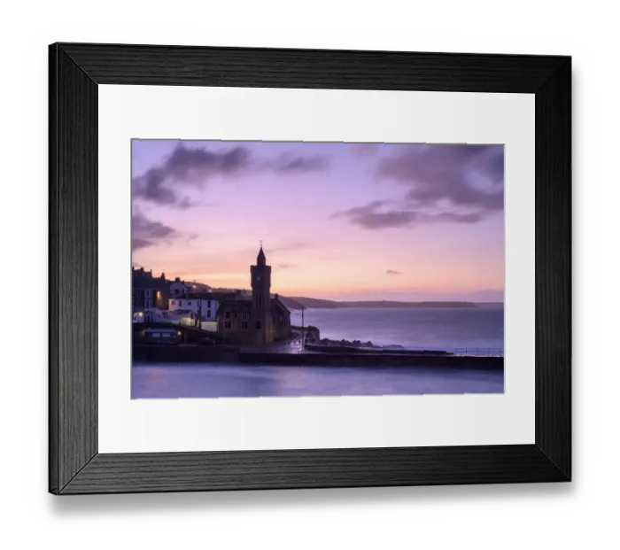 Framed Print : Porthleven clocktower and harbour with coastline beyond, at sunrise Framed Print : Porthleven clocktower and harbour with coastline beyond, at sunrise