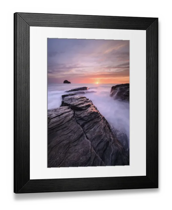 Framed Print : High tide amongst rocks on Trebarwith Strand, at sunset. North Cornwall, England, UK