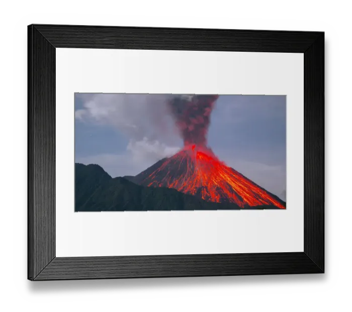 Framed Print : Reventador Volcano erupting at night, red hot boulders ejected from crater rolling down Framed Print : Reventador Volcano erupting at night, red hot boulders ejected from crater rolling down