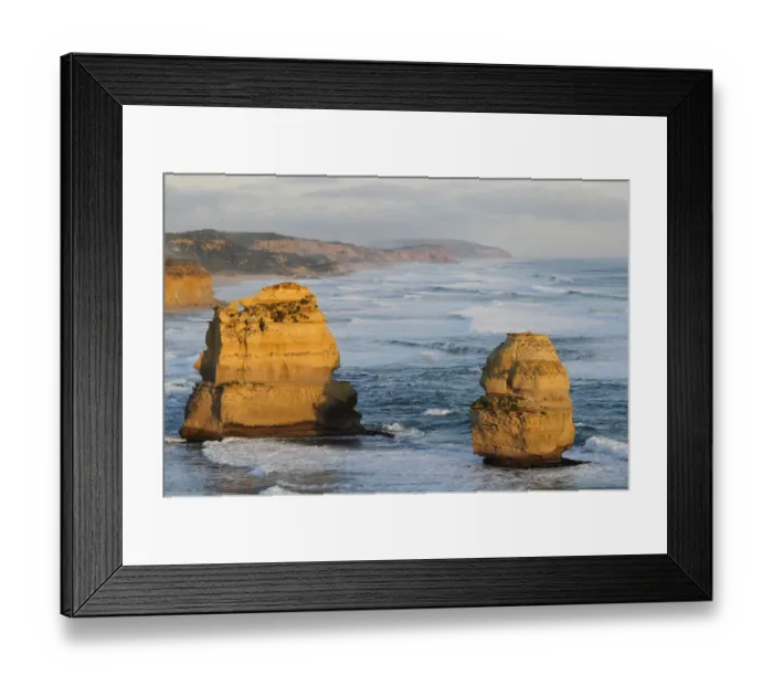 Framed Print : Sea stacks on coast in evening light. Twelve Apostles, Port Campbell National Park Framed Print : Sea stacks on coast in evening light. Twelve Apostles, Port Campbell National Park