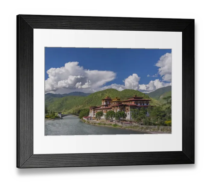 Framed Print : Bridge to Punakha Dzong, built on the confluence of the Mo Chhu (female Framed Print : Bridge to Punakha Dzong, built on the confluence of the Mo Chhu (female