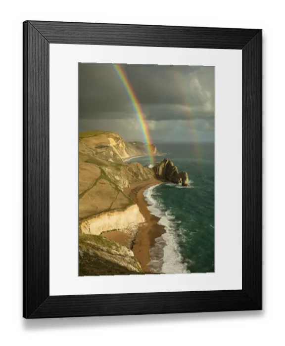 Framed Print : Rainbow over Durdle Door and the Jurassic Coast, Dorset, England, UK. October 2019 Framed Print : Rainbow over Durdle Door and the Jurassic Coast, Dorset, England, UK. October 2019
