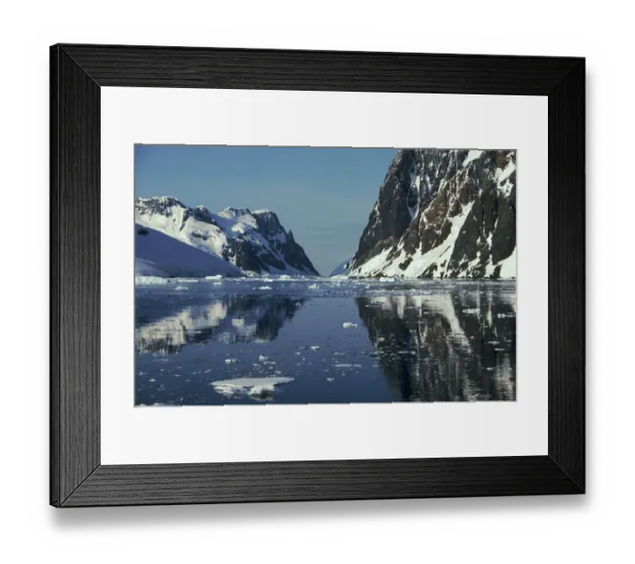 Framed Print : Reflections in Lemaire Channel with brash ice, Antarctica Framed Print : Reflections in Lemaire Channel with brash ice, Antarctica