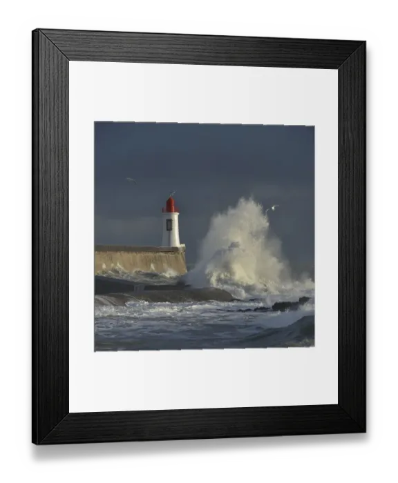 Framed Print : Waves breaking against port wall with lighthouse during storm, Vendee, France. December Framed Print : Waves breaking against port wall with lighthouse during storm, Vendee, France. December