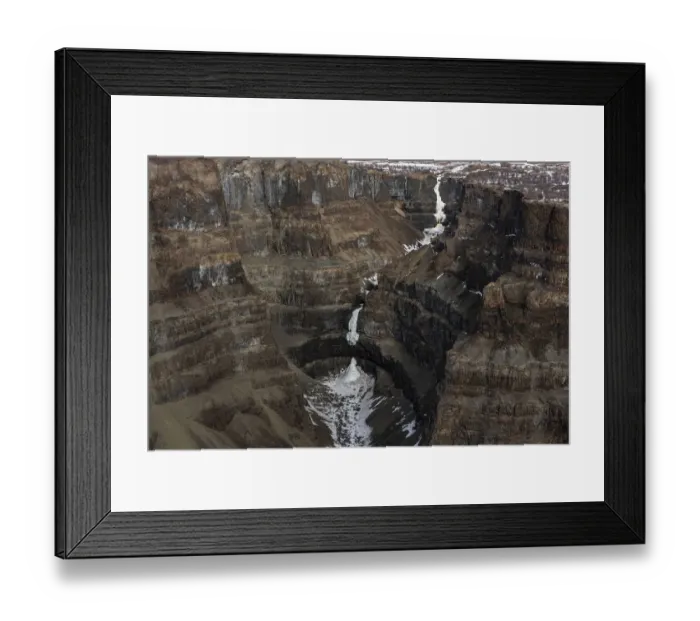 Framed Print : Aerial view of frozen waterfall in deep canyon in plateau, Putoransky State Nature Reserve, Putorana Plateau, Siberia, Russia. May, 2021 Framed Print : Aerial view of frozen waterfall in deep canyon in plateau, Putoransky State Nature Reserve, Putorana Plateau, Siberia, Russia. May, 2021