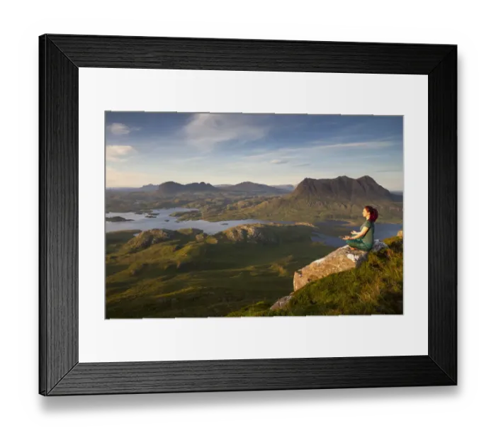 Framed Print : Woman meditating on Stac Pollaidh mountain with views of surrounding lochs and mountains, Assynt, Scotland, UK. July, 2017 Framed Print : Woman meditating on Stac Pollaidh mountain with views of surrounding lochs and mountains, Assynt, Scotland, UK. July, 2017