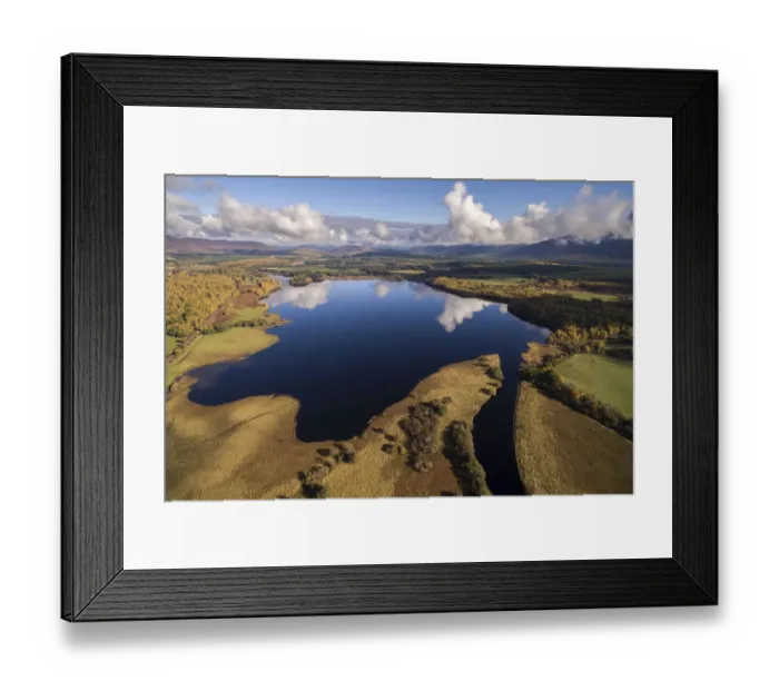 Framed Print : Clouds reflecting in Loch Insh surrounded by Insh Marshes, Cairngorms National Park, Scotland, UK. October, 2017 Framed Print : Clouds reflecting in Loch Insh surrounded by Insh Marshes, Cairngorms National Park, Scotland, UK. October, 2017