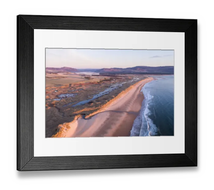 Framed Print : Aerial view of coastline and Coul Links sand dune system at sunrise, Sutherland, Scotland, North Sea, UK. March, 2020 Framed Print : Aerial view of coastline and Coul Links sand dune system at sunrise, Sutherland, Scotland, North Sea, UK. March, 2020