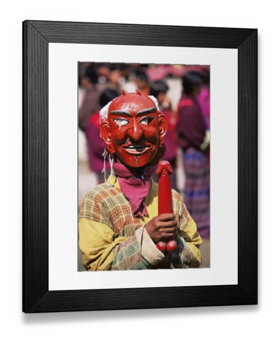 Framed Print : Festival clown in costume, Gom Kora Festival, Tashgangregion, eastern Bhutan 2001 Framed Print : Festival clown in costume, Gom Kora Festival, Tashgangregion, eastern Bhutan 2001