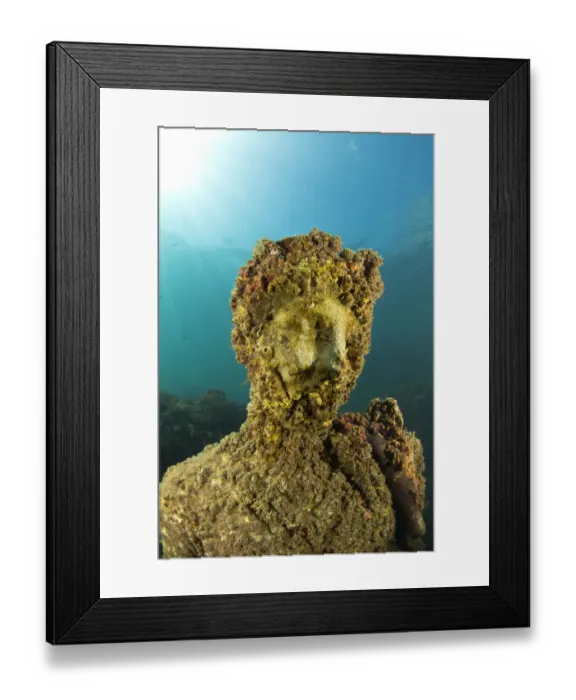 Framed Print : Ancient Roman statue of Antonia minor, member of Julio-Claudian dynasty, daughter of Marcus Anthony and sister of emperor Augustus, located in submerged Nymphaeum of Emperor Claudius. Marine Protected Area of Baia, Naples, Italy. Tyrrhenian sea