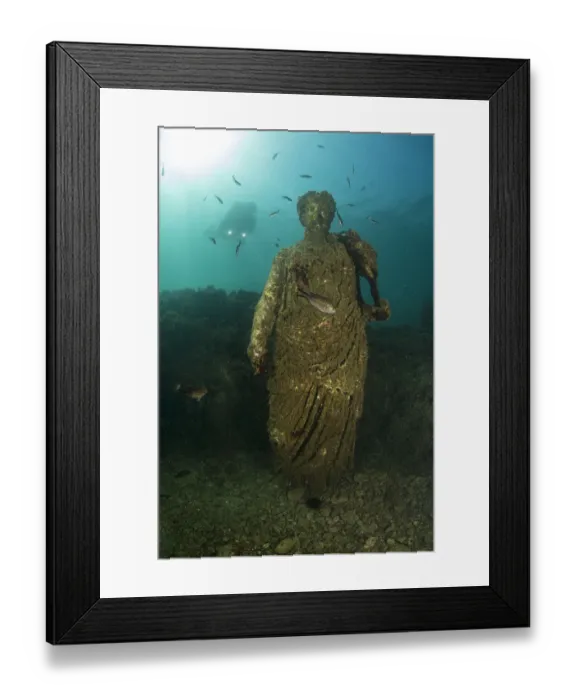 Framed Print : Scuba diver near ancient Roman Statue of Antonia minor, member of Julio-Claudian dynasty, daughter of Marcus Anthony and sister of emperor Augustus, in submerged Nymphaeum of Emperor Claudius. Marine Protected Area of Baia, Naples, Italy Framed Print : Scuba diver near ancient Roman Statue of Antonia minor, member of Julio-Claudian dynasty, daughter of Marcus Anthony and sister of emperor Augustus, in submerged Nymphaeum of Emperor Claudius. Marine Protected Area of Baia, Naples, Italy