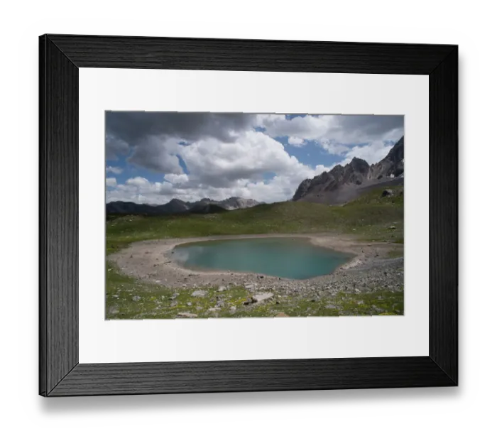 Framed Print : Alpine lake at an altitude of 2400 m, drying up during heatwave in summer, Lac des Rouites, Queyras, The Alps, France. 4th July, 2022 Framed Print : Alpine lake at an altitude of 2400 m, drying up during heatwave in summer, Lac des Rouites, Queyras, The Alps, France. 4th July, 2022