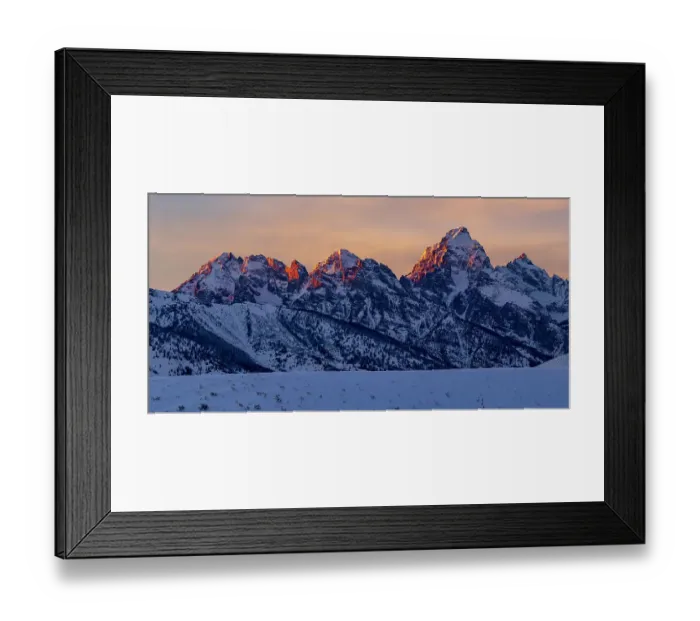 Framed Print : The last rays of sunset hit the Grand Teton and adjacent peaks on a winter evening. Grand Teton National Park, Wyoming, USA Framed Print : The last rays of sunset hit the Grand Teton and adjacent peaks on a winter evening. Grand Teton National Park, Wyoming, USA