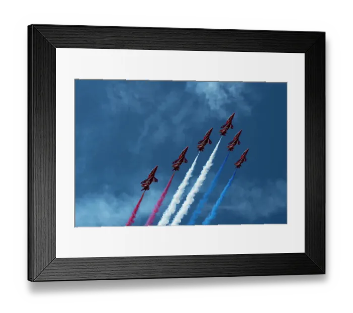 Framed Print : The Royal Air Force Red Arrows display team in formation with red, white and blue contrails, over Rhosneigr, Anglesey, Wales, UK. August, 2022 Framed Print : The Royal Air Force Red Arrows display team in formation with red, white and blue contrails, over Rhosneigr, Anglesey, Wales, UK. August, 2022